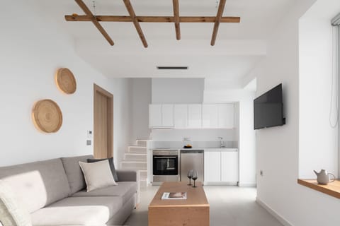 The living cum area, features a Smart 50' TV for endless movie nights.