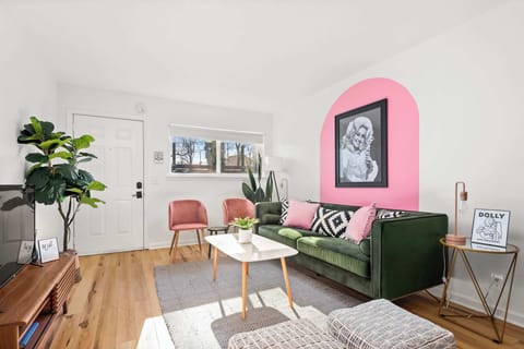 A cozy space to relax and unwind, featuring vibrant décor and a stylish arch wall.

STR Permit # 2021028384