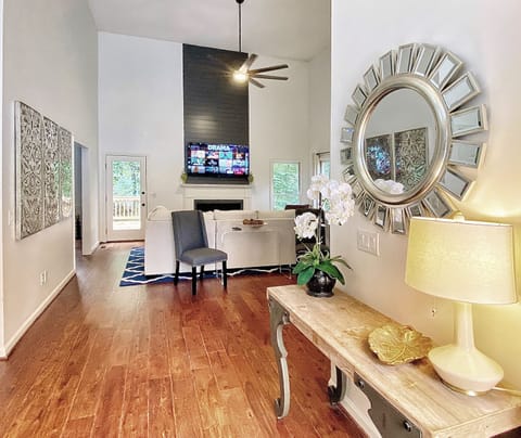 The welcoming entry way is airy with tons of natural light. 