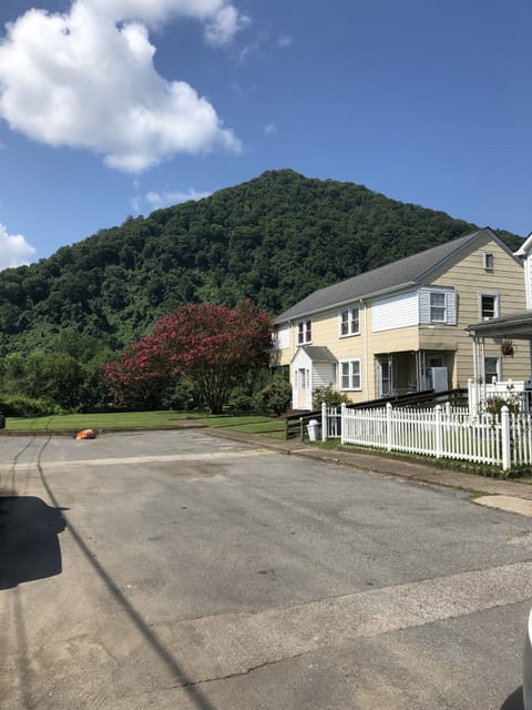 Parking in front of the apartment allows for one spot per unit. Others park road