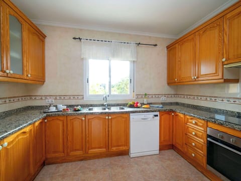 Kitchen, Kitchen Appliance, Countertop, Major Appliance, Cabinetry, Flooring, Interior Design, Kitchen Sink, Floor, Stove