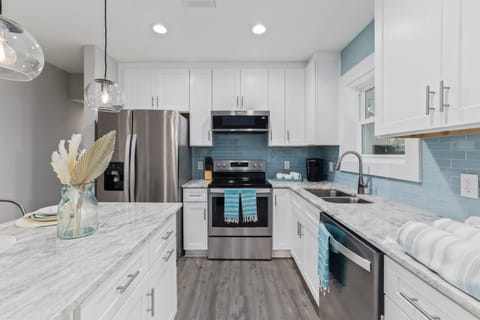 Fully stocked kitchen with modern appliances