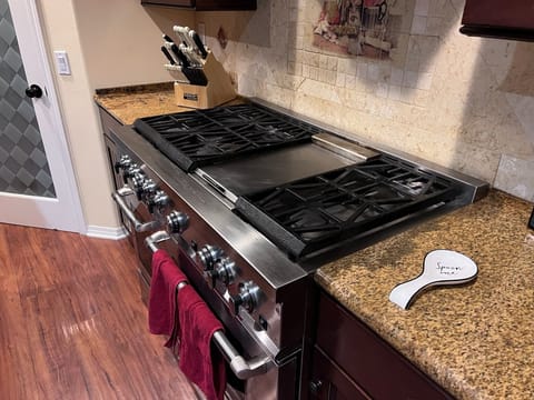2nd Floor: 6 burner stove with a griddle & double oven 
