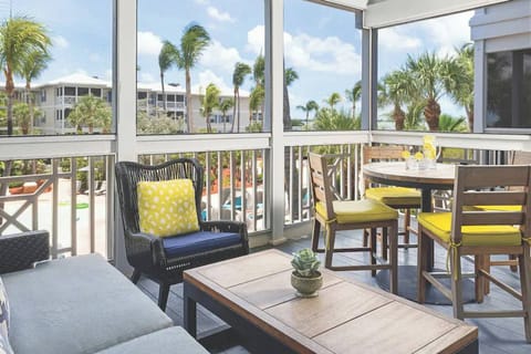 Screened in and fully furnished balcony (view varies).