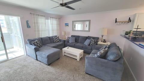 Large family room to gather in, watch large 65" Smart TV