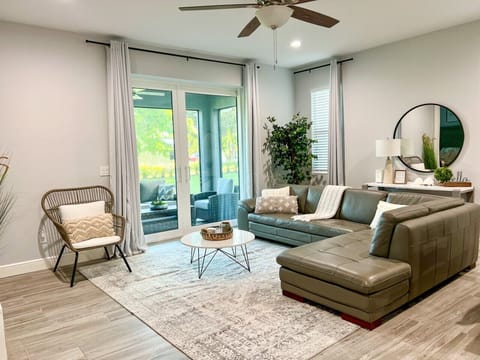 Living room with slider to outside covered patio