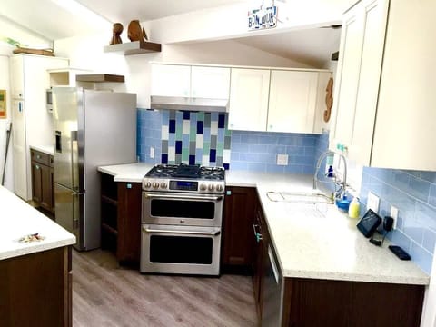 Full kitchen with gas stove, oven & dishwasher. Great for families cooking meals, business travelers needing convenience, or wine-country guests enjoying a homemade pairing.