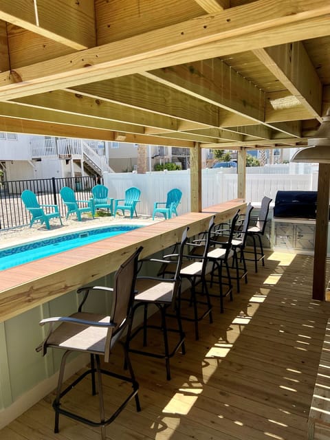 Outdoor grill by pool and the ocean!
