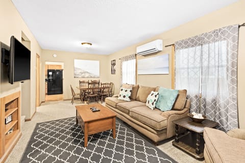 The dining room table has two leafs that can be added for extra seating