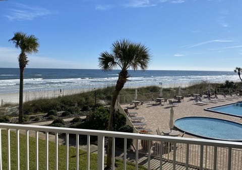 Beautiful views of Crescent beach and pool area from condo balcony!