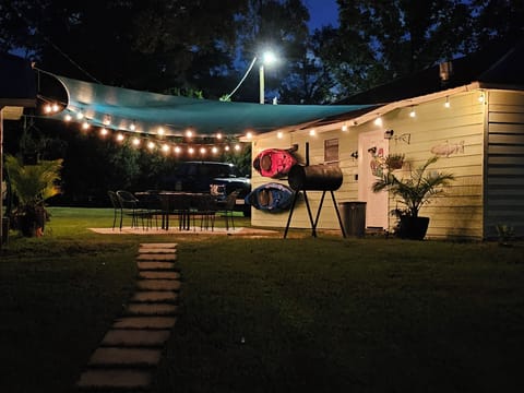 The Patio with fire pit table and BBQ grill.