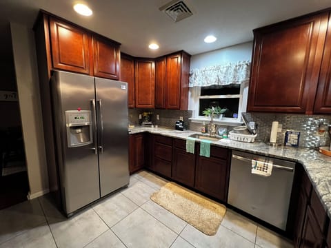 Stainless steel, refrigerator and dishwasher.