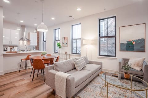 Mid Century Modern open living space with dining table for 4