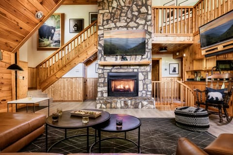 Large main living room w/ 70" 4K TV & 50" TV.
