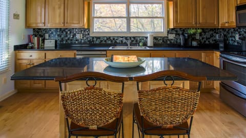 Fully stocked kitchen with new appliances.