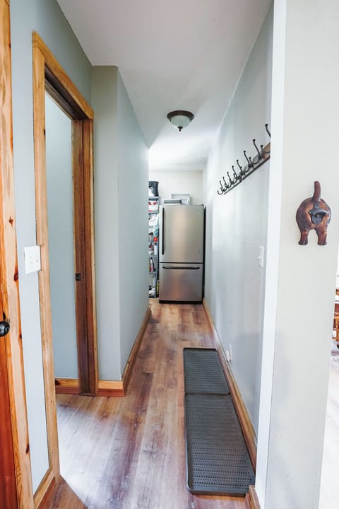 Boot + Jacket racks as well as extra fridge + laundry in the back