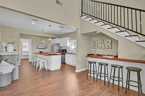 Bar and kitchen area offer plenty of extra seating. Luxury finishings