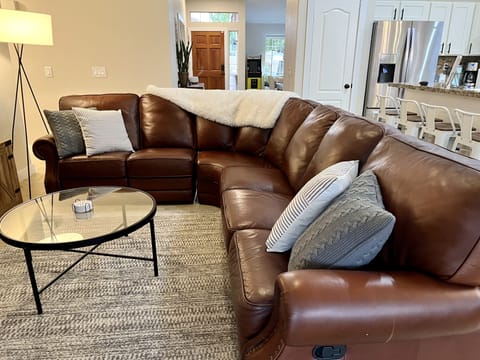 Relaxing family foom with 65" SMART TV and super comfortable leather sectional. 