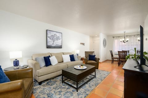 Spacious living room with cozy seating and elegant decor