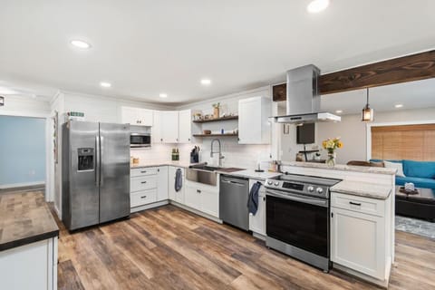 Large fully-stocked kitchen with updated appliances