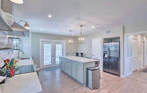 Kitchen with island (seats 4) and kitchen table on other side (seats 6)