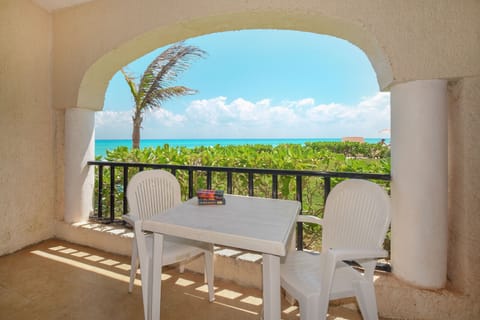 Sip on your morning coffee while you watch the waves and embrace the laidback coastal vibes!