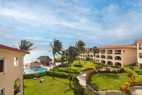 Welcome to our oceanfront retreat! Savor each day of tropical Caribbean views, right from our sparkling community pool.