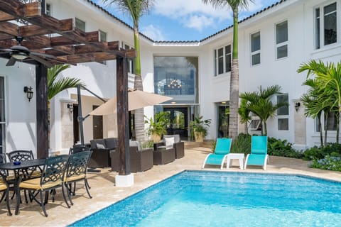 Outdoor pool, pool umbrellas, sun loungers
