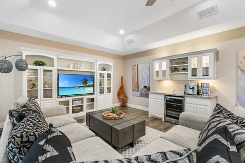 Congregate or unwind in a beautiful open concept layout. This first-class home gives you the space and the light you want to enjoy the famous South Padre Island sunrises. After a long day of sightseeing, dolphin watching and beach time, grab some snacks an