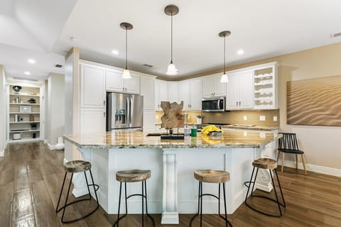 There are an abundance of close-by restaurants, but this gourmet kitchen might inspire you to culinary greatness! Nothing like custom stone countertops, stainless steel appliances, and all-new cookware to ignite your inner chef. You’ll find everything you