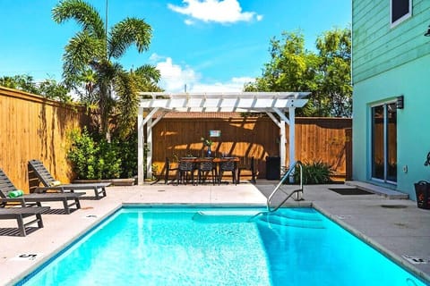 Lounge under the sun, take a refreshing dip in the sparkling pool, and enjoy alfresco meals in the outdoor dining area — everything you need for the perfect day in paradise.