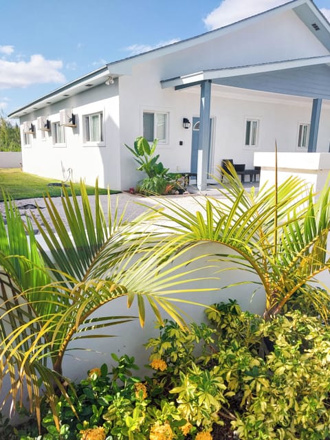Main entrance with view of yard & patio