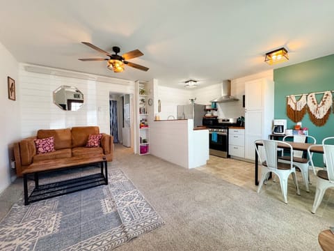 View from the front door - open layout with kitchen, living, and dining for a bright and open space.