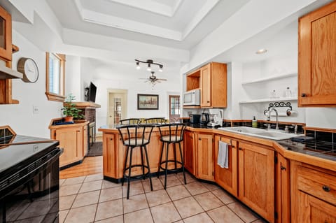 Full kitchen with everything you need to cook in or host dinner.