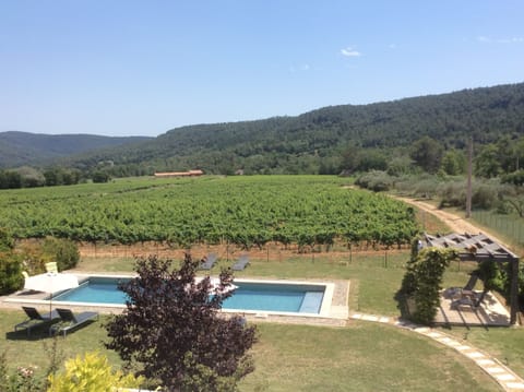 View from bedroom 3 over the pool and the vines to Salernes Golf