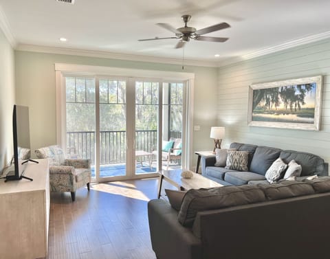 Living Room with view of moss-draped oaks