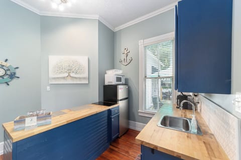 Kitchen with Refrigerator, 2 burners, coffee maker, microwave, air fryer