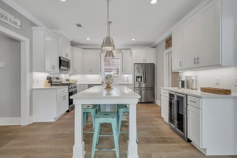Kitchen with a large island and seating for five