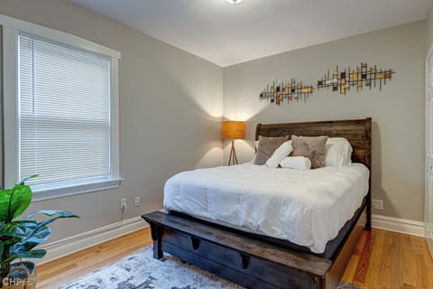 Comfortable primary bedroom with plush bedding for a restful stay