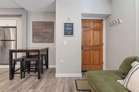 Eat a meal at the dining table.