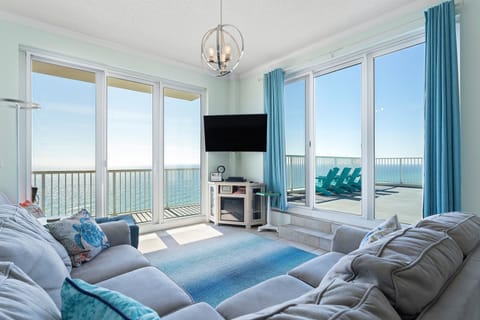 Living Room looking out to Roof Top and Gulf