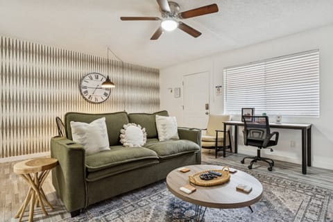 Relax in style in the living room.  This couch also has a pull out sleeper.