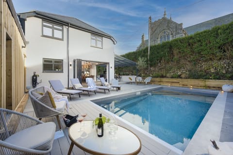 The pool outside for swimming and seating - Chy An Eglos