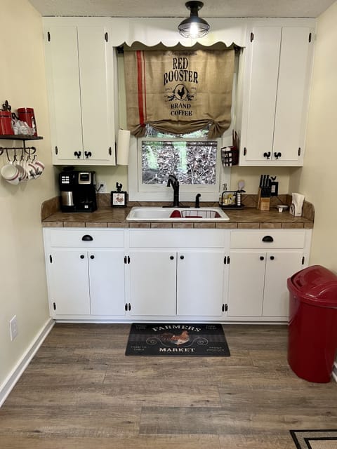 Full kitchen - drip coffee maker makes a full pot or a cup and takes K pods. 