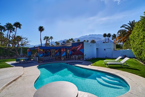 Mountain views, custom pergola, numerous poolside chill zones.