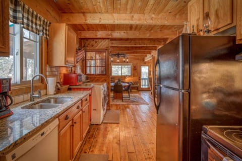 Full Kitchen with Fridge, Stove/ Oven, Coffee Makers, and Double Sink