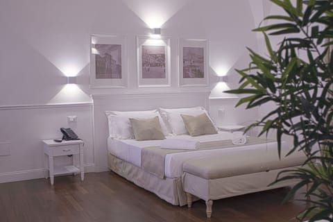 Hypo-allergenic bedding, down comforters, minibar, in-room safe