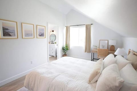 Windows in the bedroom and large en-suite bathroom provide uplifting natural light.