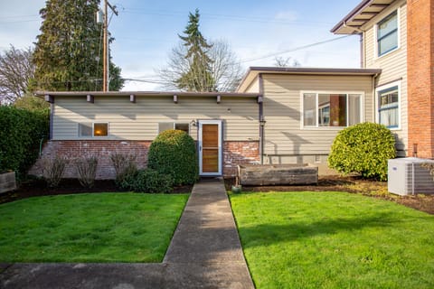 Front Door/Exterior. Cottage is attached to 2nd story home.