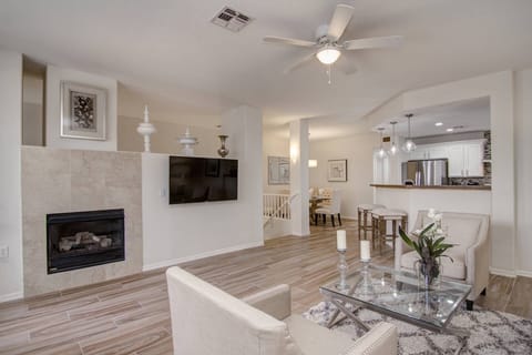 Main gathering room with flat screen tv and gas fireplace